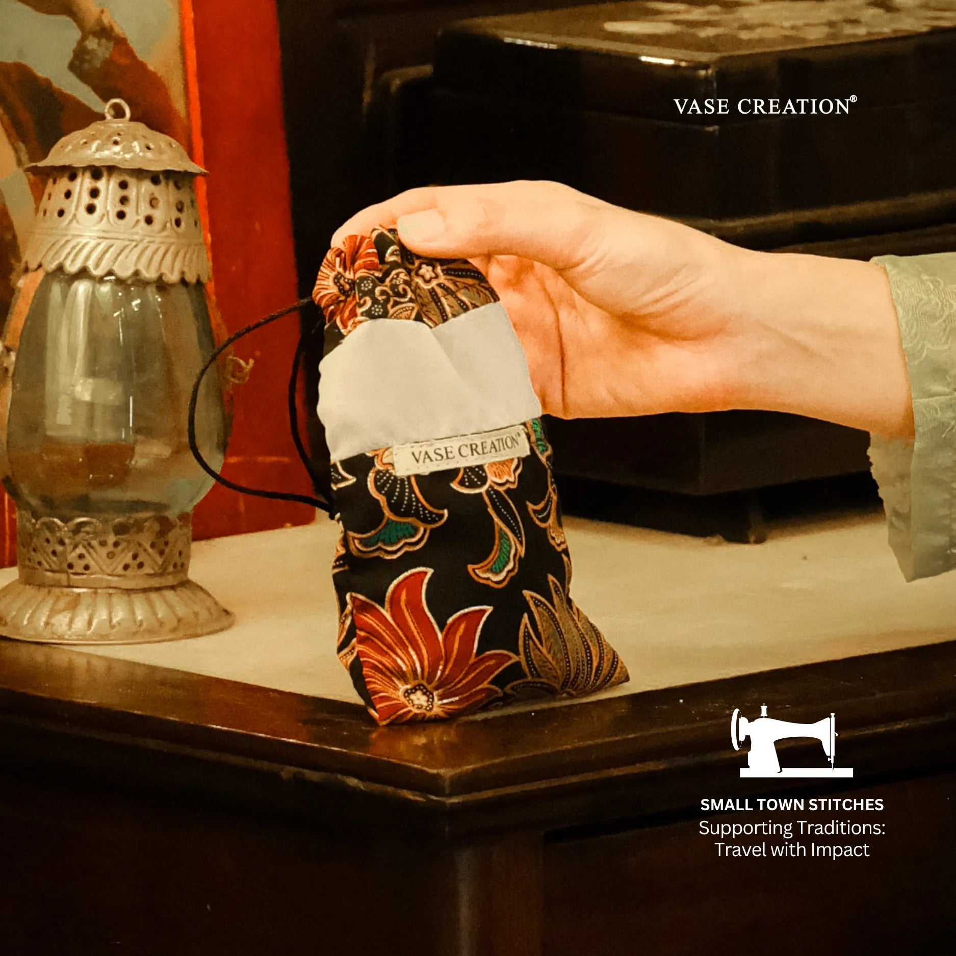 A hand holding Vase Creation Heritage Batik Journey Set